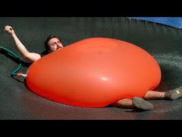 Crushed by a Giant 6ft Water Balloon - 4K - The Slow Mo Guys